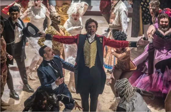  ?? NIKO TAVERNISE,, TWENTIETH CENTURY FOX ?? After reviewing trailers of new American movies, Joel Rubinoff finds them so-so. Some show promise, such as Hugh Jackman, above, in "The Greatest Showman."