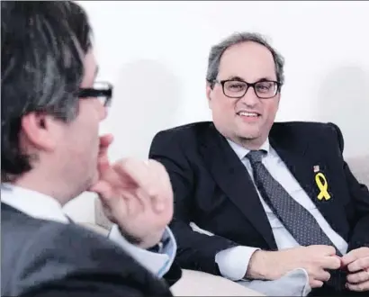  ?? LV ?? Carles Puigdemont i Joaquim Torra, durant la reunió que ahir van mantenir a Berlín