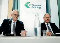  ?? PHOTO: DAVID WHITE/STUFF ?? Incoming CEO Ross Taylor, left, and outgoing chairman Sir Ralph Norris fronted to media over Fletcher Building’s losses in February.