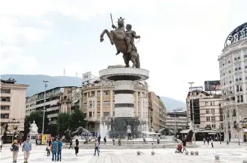  ?? — AFP photos ?? The monument of King Alexander the Great in the centre of Skopje. Macedonian­s face opposition from Greece over the claim that the legendary conqueror was Macedonian.