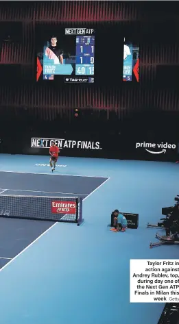  ?? Getty ?? Taylor Fritz in action against Andrey Rublev, top, during day one of the Next Gen ATP Finals in Milan this week