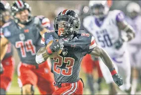  ?? AP ?? LET’S GO PEAY! Running back CJ Evans Jr. breaks out for a long touchdown run during Austin Peay’s 24-17 loss to Central Arkansas on Saturday.