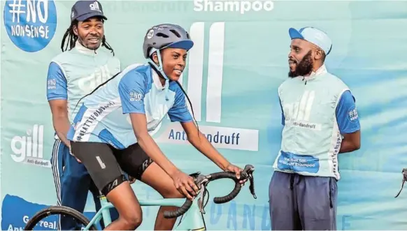  ?? /SUPPLIED ?? From left to right; coach Lebogang Matona, Lesego Matjila and coach Tebogo Kgano. The 14-year-old cycling sensation Matjila from Soweto is ready to pave the way for young girls in cycling.