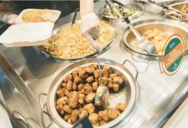  ?? JEENAH MOON/THE NEW YORK TIMES ?? A Beyond Meat chicken dish is served up earlier this month at a Panda Express restaurant in New York.