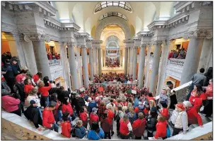  ?? AP/TIMOTHY D. EASLEY ?? Teachers from across Kentucky fill the state Capitol on Monday in Frankfort, Ky., to rally for increased funding and to protest changes to their state-funded pension system.