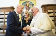  ?? VATICAN MEDIA ?? U.S. President Joe Biden (left) shakes hands with Pope Francis as they meet at the Vatican on Friday.