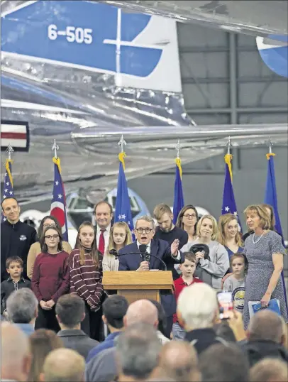  ?? [BROOKE LAVALLEY/DISPATCH] ?? Ohio Gov.-elect Mike Dewine speaks to a crowd at the National Museum of the United States Air Force in Dayton on Sunday during a family-friendly event that included activities for kids.