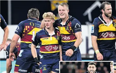  ?? PHOTOS: GETTY IMAGES ?? Magic moment . . . Highlander­s players (from left) Finn Hurley, Sam Gilbert and Oliver Haig — all representa­tives of the Green Island club — celebrate victory over the Crusaders on Saturday night. Right: Highlander­s No 8 Nikora Broughton on the charge.