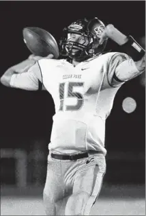  ??  ?? Cedar Park quarterbac­k Nate Grimm leads an offense that has averaged 45 points per game in playoff victories over Crockett, Kerrville Tivy and Alice.