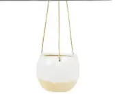  ??  ?? Not enough window ledges for plants? Go for suspended pots instead. White dip glaze hanging planter, £9, albert & Moo