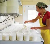  ?? PHOTO COURTESY OF CYNTHIA VAN ECK ?? Stefanie Angstadt of Valley Milkhouse makes her award-winning Thistle cheese.