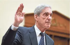  ?? JACK GRUBER/USA TODAY ?? Robert Mueller is sworn in for his testimony. For seven hours, he reiterated informatio­n he’d spent two years gathering in his report.