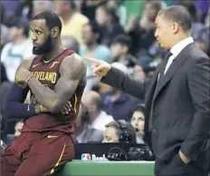  ??  ?? LeBron James and Cavaliers coach Tyronn Lue, right, are down to Boston, 2-0, but hope returning to Cleveland gets them back in the series. Game 3 is Saturday.