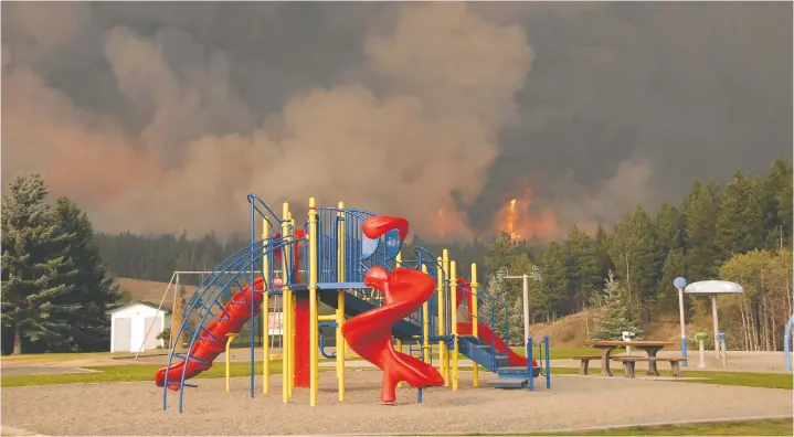  ?? GARNET MIERAU FILES ?? Forest thinning and the removal of debris on the forest floor, in hundreds of hectares surroundin­g the community, are credited with helping to save the town of 2,000 from the Tremont fire that was approachin­g Logan Lake on Aug. 14, 2021.