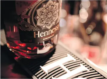  ?? ALEXANDER KOERNER / GETTY IMAGES FOR HENNESSY ?? Low- to mid- digit volume growth is expected at Hennessy, the chief financial officer of LVMH said on a conference call with analysts.