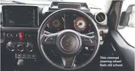  ?? ?? Thin-rimmed steering wheel feels old school.