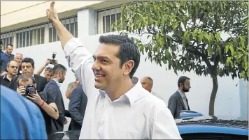  ?? Picture: REUTERS ?? Former Greek prime minister and leader of leftist Syriza party Alexis Tsipras gives the thumbs-up as he leaves a polling station after voting in the general election in Athens yesterday.