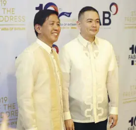  ??  ?? AFAB chairman and administra­tor Emmanuel Pineda and Bataan Governor Albert Garcia during the AFAB’s 10th anniversar­y and second State of the Freeport Address