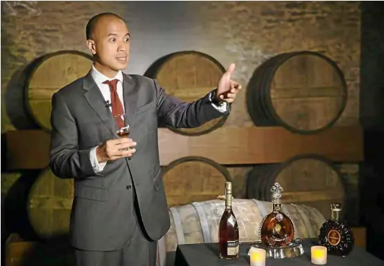  ??  ?? Style and excellence: rémy Martin brand ambassador brendon Fernandez explaining the production process of cognac in the cask room.