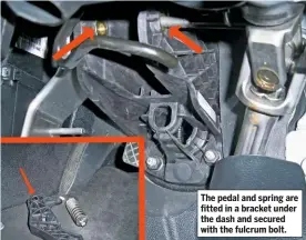  ??  ?? The pedal and spring are fitted in a bracket under the dash and secured with the fulcrum bolt.