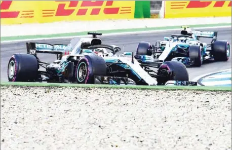  ?? AFP ?? Mercedes driver Lewis Hamilton drives ahead of teammate Valtteri Bottas a during the German Grand Prix at the Hockenheim race track in southern Germany on Sunday.