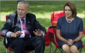  ?? JOSE LUIS MAGANA — THE ASSOCIATED PRESS ?? In this photo, Senate Minority Leader Chuck Schumer of N.Y., accompanie­d by House Minority Leader Nancy Pelosi of Calif. speak Capitol Hill in Washington.