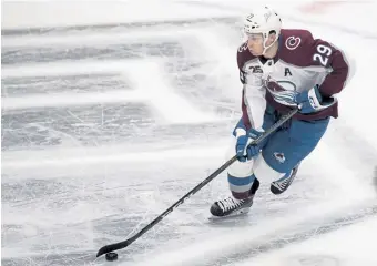  ?? Kyusung Gong, The Associated Press ?? Nathan MacKinnon is the fourth player to reach 500 points in an Avalanche sweater, joining Joe Sakic (1,015), Milan Hejduk (880) and Peter Forsberg (705) on the list.