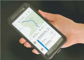  ?? Associated Press file ?? A photo a mobile phone displays a user's travels in New York. Google records your movements even when you explicitly tell it not to.