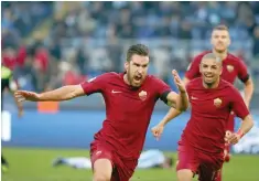  ?? — Reuters ?? AS Roma’s Kevin Strootman celebrates after scoring.