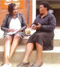  ??  ?? Matongo (right) outside a Glen View hall soon after her advocacy role in HIV awareness chats to Lifestyle reporter Mirirai Nsingo