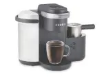  ??  ?? Give dad an easy to use machine that makes iced or hot coffee, lattes and cappuccino­s for year-round enjoyment. K-café single serve coffee, latte and cappuccino maker with frother, $200, Keurig.ca.