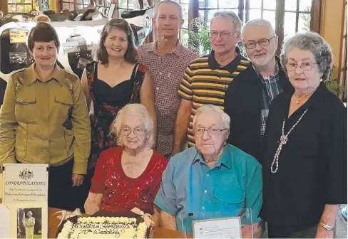  ??  ?? HARD WORKERS: Ena and Wal Billingham of Mt Garnet (front) with their six children (from left) Diana Knowlton, Janet Minniss, Stephen Billingham, Thomas Billingham, Walter Billingham and Frances Langtree. BELOW: Wal and Ena (centre) with Charles and...