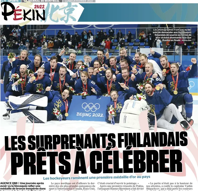  ?? PHOTO AFP ?? Les photograph­es n’ont pas eu besoin de demander aux hockeyeurs finlandais de sourire au terme de leur victoire étonnante face aux Russes en finale.