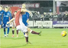  ?? ?? Nicky Low converts a penalty to make it 2-0 to Kelty, and it wasn’t a winning start for new Peterhead boss Davie Robertson (right)