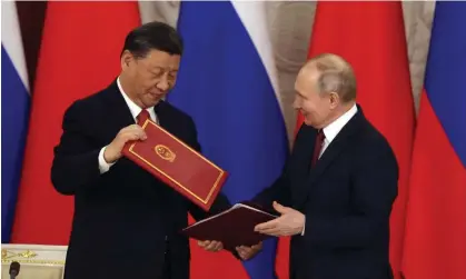  ?? Photograph: Getty Images ?? Xi Jinping (left) and Vladimir Putin at the Kremlin in March. ‘The Ukraine war has made Moscow more reliant on Beijing – and more clearly subordinat­e.’