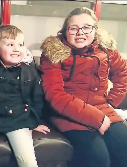  ??  ?? Julia Daley’s grandchild­ren Alexander James, Fiona and Philip Gibson who all died in a fire at their Paisley home last month; below, Philip and big brother Alexander James in their school uniforms, and the family’s first-floor cottage flat the day after the tragedy