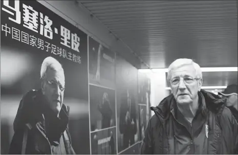  ??  ?? Head coach of Chinese national soccer team Marcello Lippi arrives for a press conference on Wednesday in Changsha, Central China’s Hunan Province.