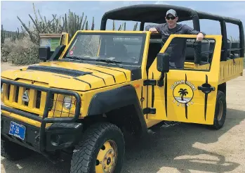  ??  ?? Writer Ryan Wolstat heads out on an off-road experience in Aruba to visit a natural pool.