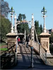  ??  ?? Victoria Bridge, with its white lattice-work towers, is a footbridge built to commemorat­e the late Queen’s Diamond Jubilee in 1897.