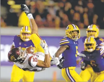  ?? Ben Margot Associated Press ?? USC FRESHMAN RECEIVER Drake London makes an acrobatic catch against California. Says offensive coordinato­r Graham Harrell: “He has the opportunit­y to be as good, if not better than any of the guys we have.”