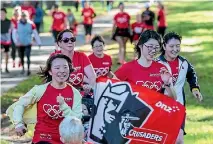  ?? PHOTO: STACY SQUIRES/FAIRFAX NZ ?? About 1000 people took part in the Jennian Homes Mother’s Day Fun Run around Christchur­ch’s Hagley Park yesterday.