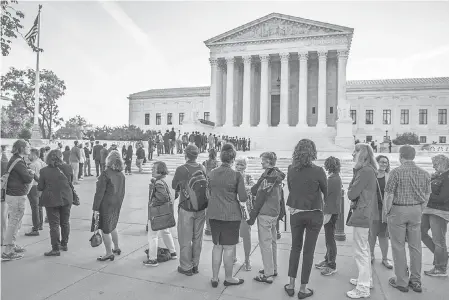  ??  ?? The Supreme Court has 20 decisions to make before the end of the term next week. J. SCOTT APPLEWHITE/AP