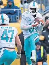  ?? JIM RASSOL/STAFF PHOTOGRAPH­ER ?? Miami Dolphins free safety Michael Thomas says the team wanted to go all the way to the Super Bowl.