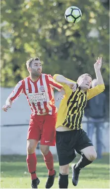  ??  ?? Up for it: Myers (red and white) battle it out with Millfield Free Gardeners last week. Pictures by Tim Richardson