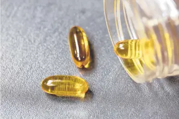  ?? DREAMSTIME ?? Research finds taking fish oil won’t raise a-fib risk.