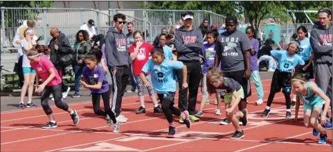  ?? MIKE BUSH/NEWS-SENTINEL STAFF ?? A group of fifth grade girls take off in the 50 meter dash at Saturday morning's All-City Youth track and field meet at Lodi High.