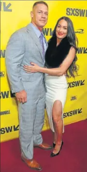  ?? PHOTO: JACK PLUNKETT/INVISION/AP ?? John Cena and Nikki Bella are WWE stars