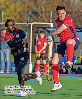  ?? ?? Barton’s Ben Everett-li (right) in defensive action against Khalsa on Saturday.