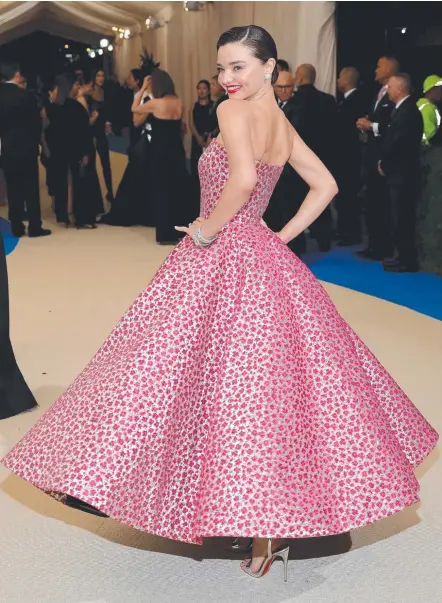  ?? Picture: NEILSON BARNARD/GETTY IMAGES ?? Miranda Kerr arrives at the Met Gala in New York in a stunning Oscar de la Renta dress.