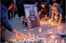  ??  ?? A vigil for murdered Bulgarian reporter Viktoria Marinova